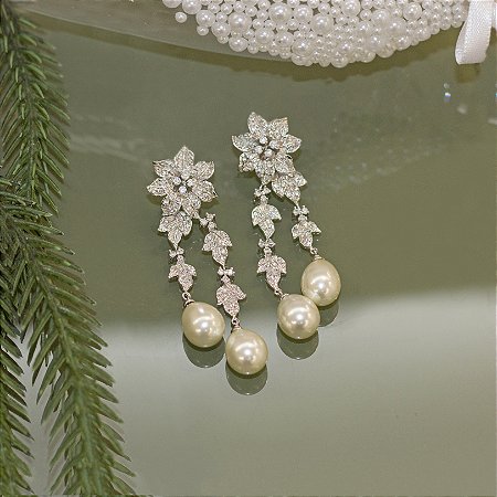Brinco com pérola e microzircônias