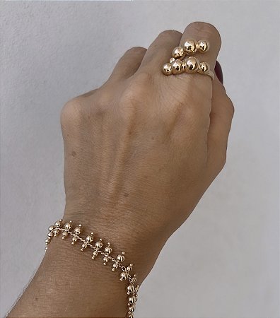 ANEL AJUSTAVEL BOLINHAS BANHADO A OURO 18 K