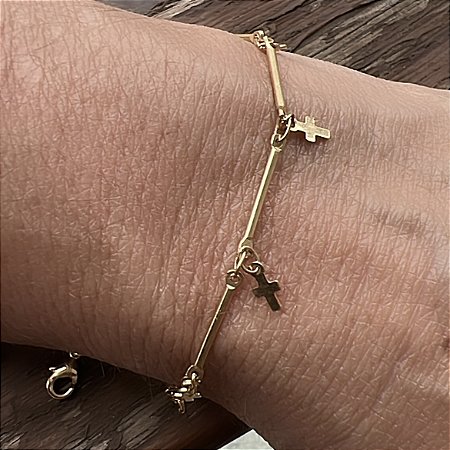 PULSEIRA COM CRUZ BANHADA A OURO 18 K.