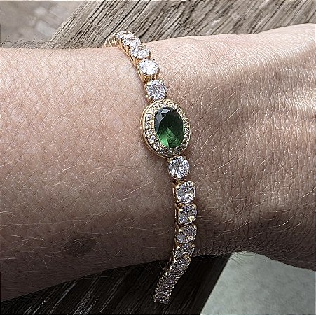 PULSEIRA RIVIERA CRISTAL E PEDRA VERDE BANHADA A OURO 18K