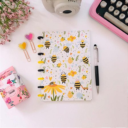 CADERNO COM MINI DISCOS ABELHINHAS