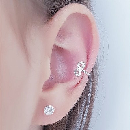 Piercing Fake Infinito e Zirconias