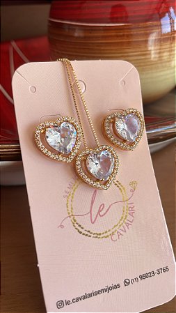 Conjunto coração de zircônia cristal  cravejado com zirconias cristal no banho ouro18k