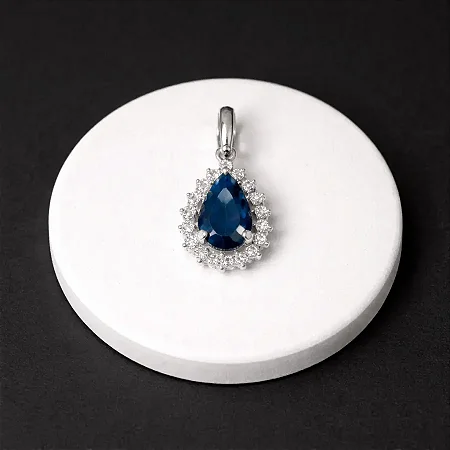 Pingente gota pedra azul com zircônias brancas ao redor P087 ( Prata 925 )