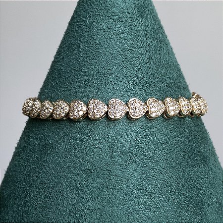 Pulseira riviera em formato de mini corações cravejados com zircônias na cor cristal 18cm de comprimento com banho de ouro 18k