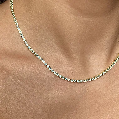 Colar riviera cravejado com zircônias na cor aqua com espessura 2 mm e comprimento 39cm em prata 925 com banho de ouro 18k