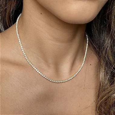 Colar riviera cravejado com zircônias na cor cristal com espessura 2 mm e comprimento 39cm em prata 925 com banho de ouro 18k ou ródio branco