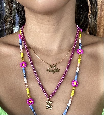 Pingente ursinho liso com coração cravjeado com zircônias na co cristal com banho de ouro 18k