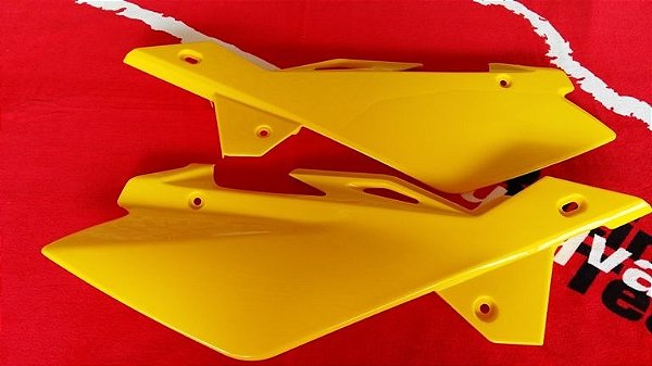 Tampas laterais do banco Husqvarna WR 125 2006