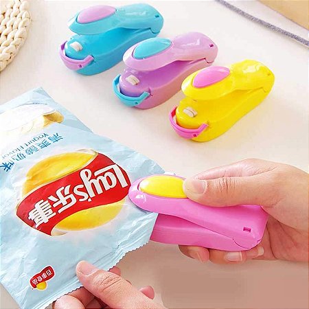 Mini Seladora para Plástico Lacra Embalagem Manual Portátil (pilha)