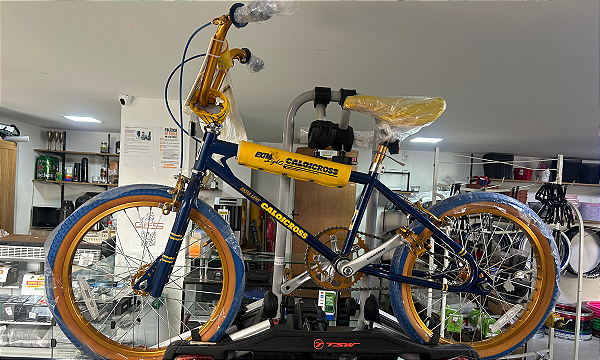 BICICLETA ARO (20) MASCULINA COR AZUL/AMARELO/DOURADO  S/MARCHA MARCA CALOI CROSS EXTRA LIGHT