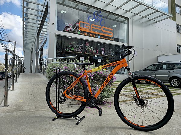BICICLETA MTB ARO (29) OXS ALUMINIO 21 VELOCIDADES FREIO DISC MECÂNICO 17 (M) LARANJA/VINHO