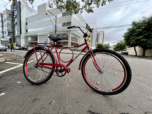 BICICLETA ARO (26) MASCULINA COR VERMELHA S/MARCHA FREIO V/BRAKE (A MÃO) E CONTRAPEDAL MARCA ATTACK BARRA SUPER FORTE