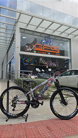 BICICLETA MTB FREERIDE ARO (26) VIKINGX TUFF 25 CAMBIO SHIMANO 21V FREIO DISC MECANICO QUADRO 13 (PP) COR PRATA/AZUL