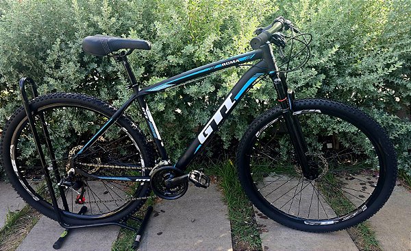 BICICLETA MTB ARO 29 GTI ROMA ALUMINIO 21V IMPORTADO FREIO DISC MECÂNICO 19 (G) PRETO/AZUL