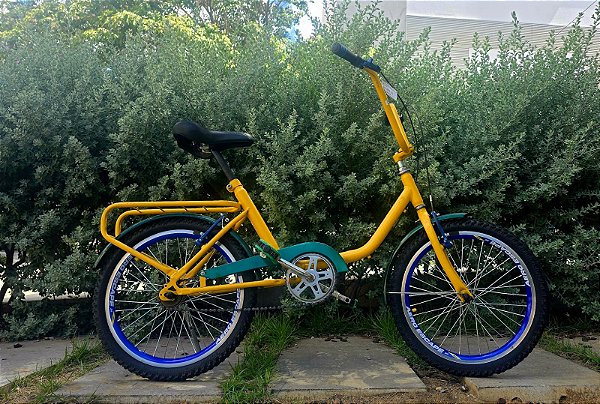 BICICLETA ARO (20) MASCULINA COR VERDE/AMARELA  S/ MARCHA MARCA TIPO MONARETA ( USADA )