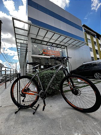 BICICLETA MTB ARO (29) HAVOK NX 18V FREIO DISC HIDRÁULICO QUADRO 17 (M) INOX/LARANJA