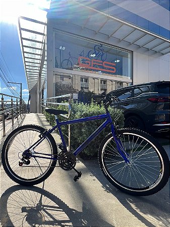 BICICLETA ARO (26) MASCULINA COR AZUL C/MARCHA 18V MILANO AUTUMN