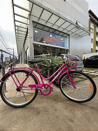 BICICLETA ARO (26) FEMININA COR ROSA FUCSIA S/MARCHA FREIO V-BRAKE ( A MÃO) MARCA MONARK BRISA