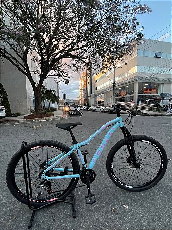 BICICLETA MTB ARO (29) COLLI EUDORA 21 VELOCIDADES (3X7) FREIO DISC HIDRÁULICO QUADRO 15 (P) AZUL BEBE/ROSA (USADA)