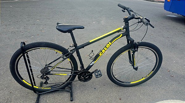 BICICLETA ARO (29) MASCULINA CALOI VELOX KIT 21 VELOCIDADES FREIOS V-BRAKE COR PRETO/AMARELO (USADA)