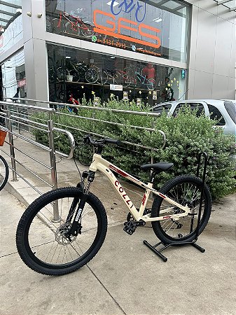 BICICLETA ARO (24) COLLI NAPOLI PRO ALUMINIO 9 VELOCIDADES (1X9) SHIMANO CUES FREIO DISC HIDRAULICO COR BEGE (RETRO)