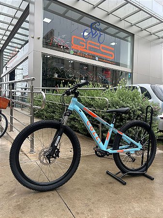 BICICLETA ARO (24) COLLI NAPOLI PRO ALUMINIO 9 VELOCIDADES (1X9) SHIMANO CUES FREIO DISCO HIDRAULICO COR AZUL CHAMPANHE