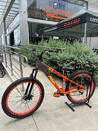 BICICLETA MTB FREERIDE ARO (26) RAVA CAMBIO 7VELOCIDADES (1X7) FREIO DISCO MECÂNICO COR LARANJA/MARRON/AMARELO