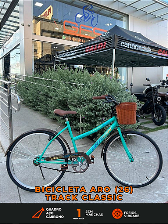 BICICLETA ARO (26) FEMININA TRACK CLASSIC SEM MARCHA FREIOS V-BRAKE COM CESTA COR ANIS FROZEN/MARROM
