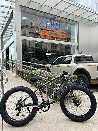 BICICLETA GTS FAT BIKE ARO 26 FREIO DISCO HIDRÁULICO CÂMBIO TSI 7 MARCHAS QUADRO DE ALUMÍNIO M1 I-VTEC FAT PRETA (USADA)