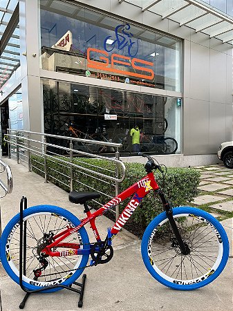 BICICLETA MTB FREERIDE ARO (26) VIKINGX TUFF X-25 CAMBIO 7VELOCIDADES (1X7) FREIO DISCO MECÂNICO COR VERMELHO/AZUL