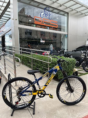 BICICLETA MTB FREERIDE ARO (26) VIKINGX TUFF X-25 CAMBIO 7VELOCIDADES (1X7) FREIO DISCO MECÂNICO COR AZUL/AMARELO