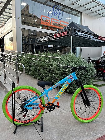 BICICLETA MTB FREERIDE ARO (26) VIKINGX TUFF-25 KIT 7 VELOCIDADES FREIO DISC HIDRÁULICO TRASEIRO COR AZUL/LARANJA/VERD