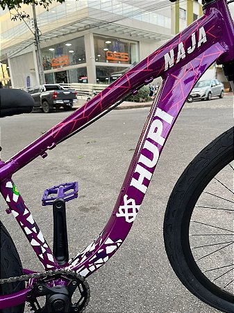BICICLETA MTB FREERIDE ARO (26) HUPI NAJA KIT SINGLE S/MARCHA FREIO DISC HIDRÁULICO TRASEIRO SHIMANO COR ROXO/BRANCO