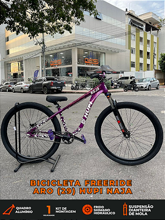 BICICLETA MTB FREERIDE ARO (29) HUPI NAJA KIT SINGLE S/MARCHA FREIO DISC HIDRÁULICO TRASEIRO SHIMANO COR ROXO/BRANCO