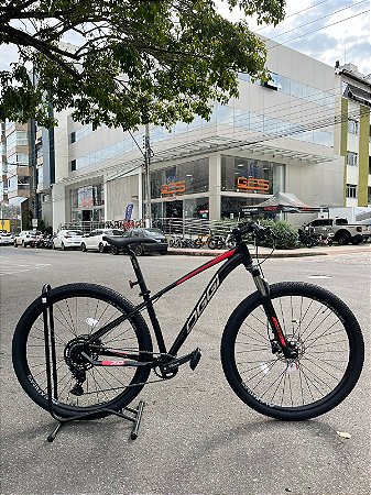BICICLETA MTB ARO (29) OGGI 7.0 SHIMANO CUES 9 VELOCIDADES FREIO DISC HIDRÁULICO TAMANHO 15 (P) PRETO/VERMELHO