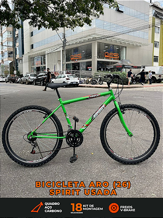 BICICLETA ARO (26) MASCULINA SPIRIT MAX 18 VELOCIDADES FREIOS V-BRAKE COR VERDE (USADA)
