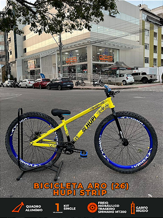 BICICLETA MTB FREERIDE ARO (26) HUPI STRIP KIT SINGLE (SEM MARCHA) FREIO DISC TRASEIRO SHIMANO MT200 COR AMARELO/AZUL
