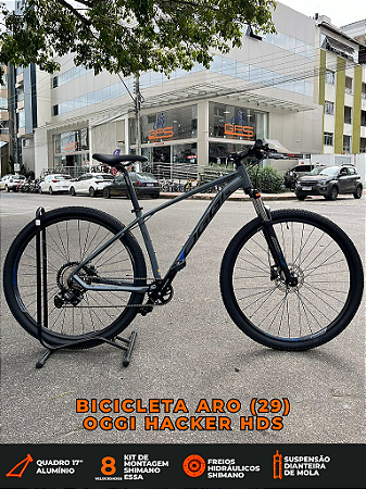 BICICLETA MTB ARO (29) OGGI HACKER HDS SHIMANO ESSA 8V FREIO DISC HIDRÁULICO TAMANHO 17 (M) COR GRAF/AZUL/PTO