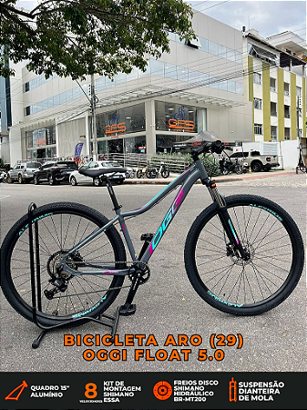 BICICLETA MTB ARO (29) OGGI FLOAT 5.0 SHIMANO ESSA 8 VELOCIDADES FREIO DISC HIDRÁULICO TAMANHO 15 (P) COR GRAF/ROSA/AZUL