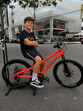 BICICLETA ARO (20) MTB COLLI AIRON 7 VELOCIDADES (1X7) FREIO A DISCO MECÂNICO COR LARANJA NEON