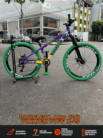 BICICLETA MTB FREERIDE ARO (26) VIKINGX TUFF X-25 CAMBIO 7 VELOCIDADES FREIO DISCO MECÂNICO COR ROXO/VERDE