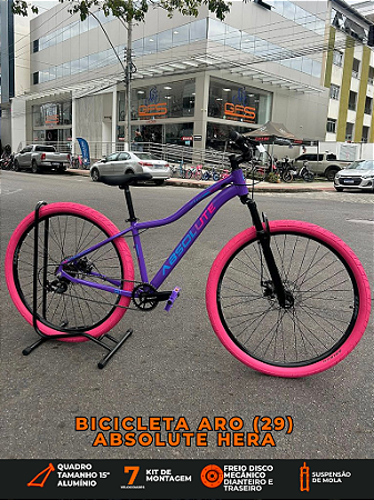 BICICLETA MTB ARO (29) ABSOLUTE HERA 7 VELOCIDADES (1X7) FREIO A DISCO MECÂNICO TAMANHO 15 (P) COR ROXO/ROSA