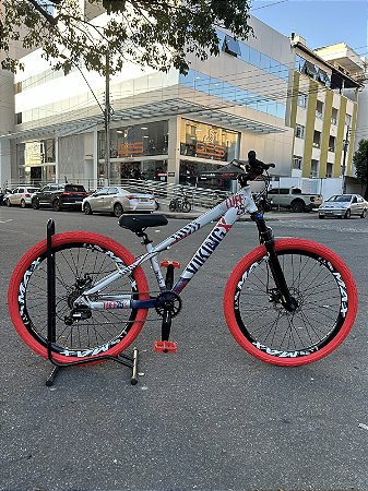 BICICLETA MTB FREERIDE ARO (26) VIKINGX TUFF-25 KIT 7 VELOCIDADES FREIO A DISCO MECÂNICO COR PRATA/AZUL/VERMELHO