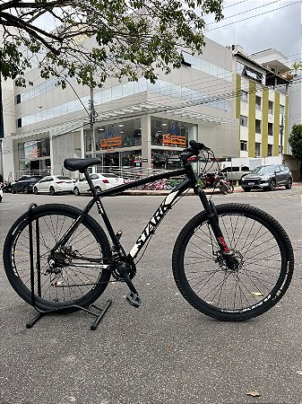 BICICLETA MTB ARO (29) STARK KIT 21 VELOCIDADES FREIO DISCO MECÂNICO TAMANHO (21) COR PRET/BRANCO (USADA)
