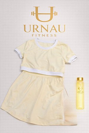 Conjunto de croped com bojo removível amarelo manteiga com detalhes branco e saia com short - Tamanho: M