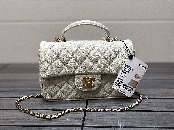 chanel pearl flap bolsa