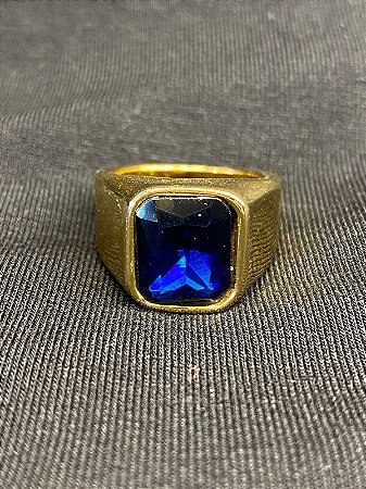 DEDEIRA COM PEDRA AZUL BANHADA A OURO 18K