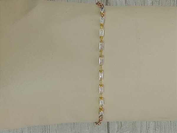 Pulseira baguete zircônia e corrente tipo cartier