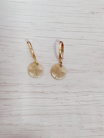 Argola com moeda riscada